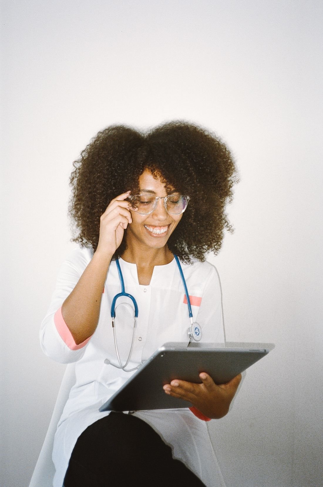 A smiling healthcare professional ready to help